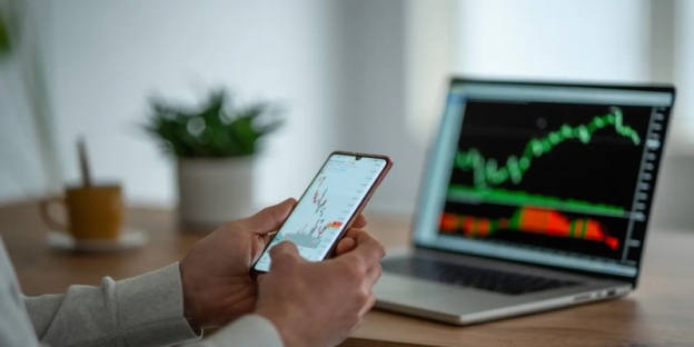 A person holding a cellphone AI-generated content may be incorrect.